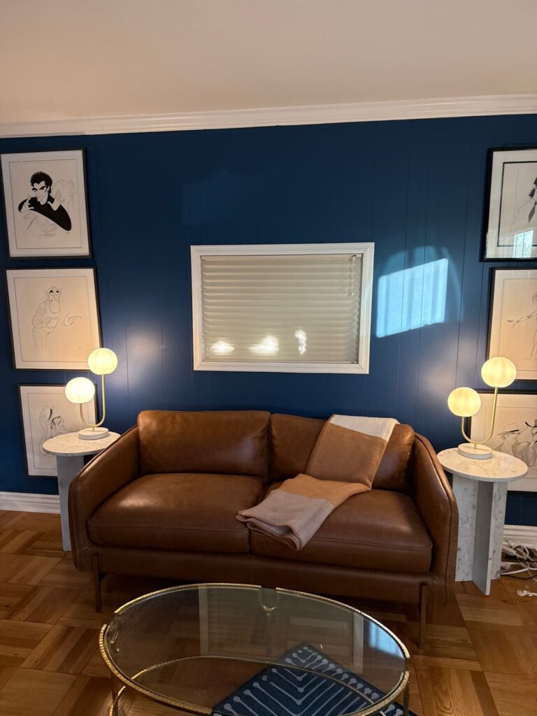 Therapy room with a leather sectional at Unfold Psychology San Jose, Rose Garden